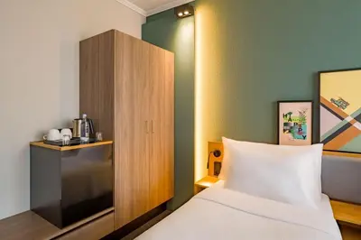Ein Bett oder Betten in einem Zimmer der Unterkunft Spark by Hilton Wuppertal City Centre