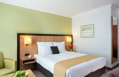 Ein Bett oder Betten in einem Zimmer der Unterkunft Leonardo Hotel Düsseldorf Airport Ratingen