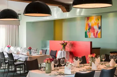 Ein Restaurant oder anderes Speiselokal in der Unterkunft Mintrops Land Hotel Burgaltendorf