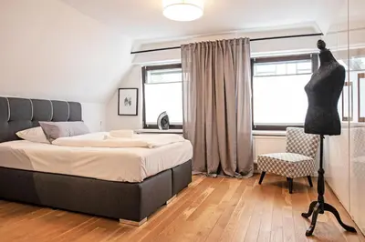 Ein Bett oder Betten in einem Zimmer der Unterkunft Pension Café Eisgold
