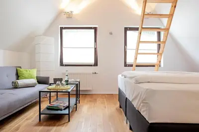 Ein Bett oder Betten in einem Zimmer der Unterkunft Pension Café Eisgold