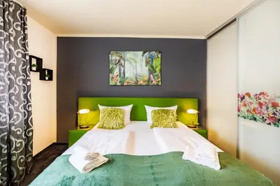 Ein Bett oder Betten in einem Zimmer der Unterkunft Hotel Fürst Garden