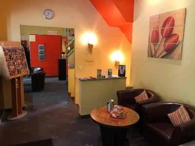 Ein Sitzbereich in der Unterkunft City Hotel Essen