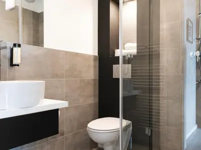 Ein Badezimmer in der Unterkunft JustStay Solingen Hotel & Apartments