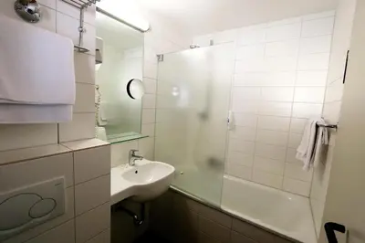 Ein Badezimmer in der Unterkunft Atelier Hotel Essen-City