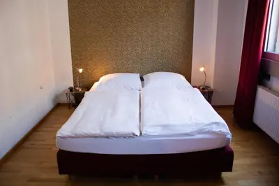 Ein Bett oder Betten in einem Zimmer der Unterkunft Hotel Stern - Self Check-In