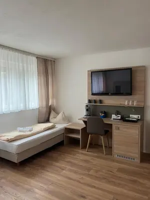 Ein Bett oder Betten in einem Zimmer der Unterkunft Hubertus-Hof