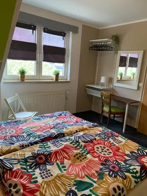 Ein Bett oder Betten in einem Zimmer der Unterkunft Hotel Zur Schleuse (Garni)