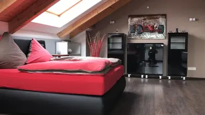 Ein Bett oder Betten in einem Zimmer der Unterkunft Stadtvilla Intzeplatz - Apartment Norderney
