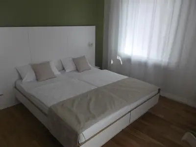 Ein Bett oder Betten in einem Zimmer der Unterkunft ART Hotel Ufer
