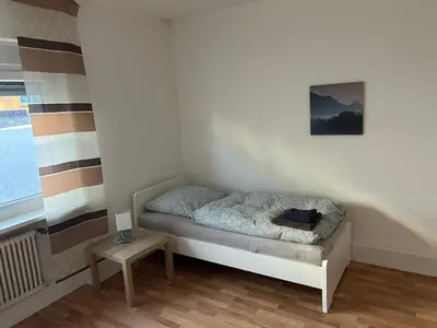 Ein Bett oder Betten in einem Zimmer der Unterkunft Monteurwohnung Hagen Haus 1