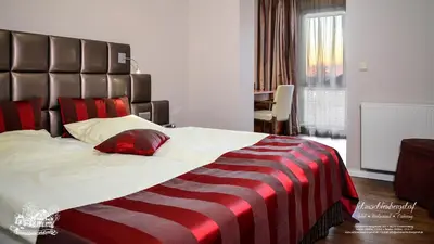 Ein Bett oder Betten in einem Zimmer der Unterkunft Hotel-Restaurant Schmachtenbergshof