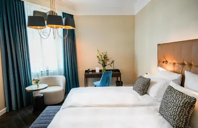 Ein Bett oder Betten in einem Zimmer der Unterkunft Steigenberger Icon Parkhotel Düsseldorf