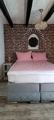 Ein Bett oder Betten in einem Zimmer der Unterkunft Am Hallenbad Hotel garni