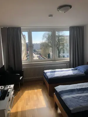 Ein Bett oder Betten in einem Zimmer der Unterkunft Micha's Ferienwohnung