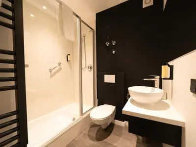 Ein Badezimmer in der Unterkunft JustStay Ratingen Hotel & Apartments