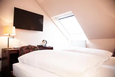 Ein Bett oder Betten in einem Zimmer der Unterkunft Hotel Lonac