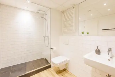 Ein Badezimmer in der Unterkunft Glück Auf Appartements Düppelstraße