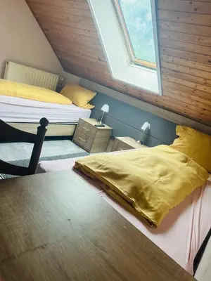 Ein Bett oder Betten in einem Zimmer der Unterkunft Hotel-Restaurant Olympia