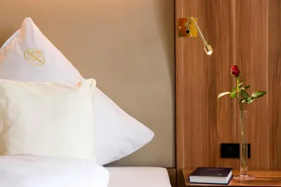 Ein Bett oder Betten in einem Zimmer der Unterkunft Ringhotel Katharinen Hof