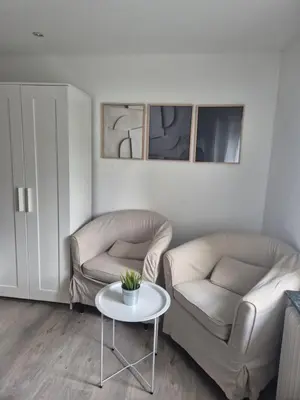 Ein Sitzbereich in der Unterkunft Puppenstube mir 2 Zimmer anstatt 3 Zimmer