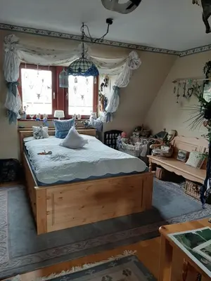 Ein Bett oder Betten in einem Zimmer der Unterkunft FW Bines Rosengarten