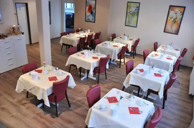 Ein Restaurant oder anderes Speiselokal in der Unterkunft Concorde Hotel Ascot