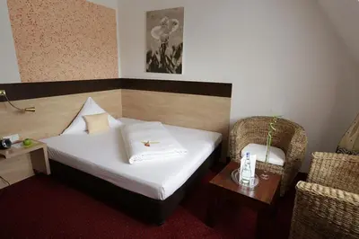 Ein Bett oder Betten in einem Zimmer der Unterkunft Hotel Cascade Superior