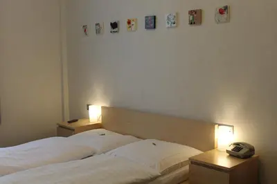 Ein Bett oder Betten in einem Zimmer der Unterkunft Hotel Weidenhof