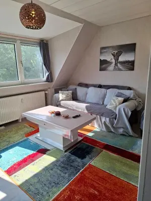 Ein Sitzbereich in der Unterkunft Ferienwohnung am Stadion Bochum Grumme