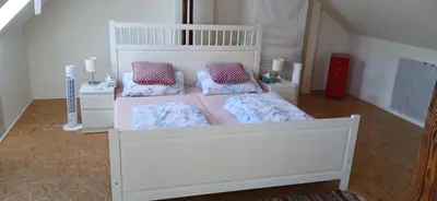 Ein Bett oder Betten in einem Zimmer der Unterkunft Nette, geräumige Ferienwohnung