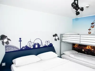 Ein Bett oder Betten in einem Zimmer der Unterkunft AKZENT Hotel am Schlosspark Herten