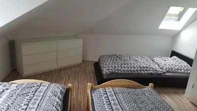 Ein Bett oder Betten in einem Zimmer der Unterkunft Ferienwohnung in Essen
