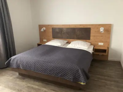 Ein Bett oder Betten in einem Zimmer der Unterkunft Hotel Alter Giebel