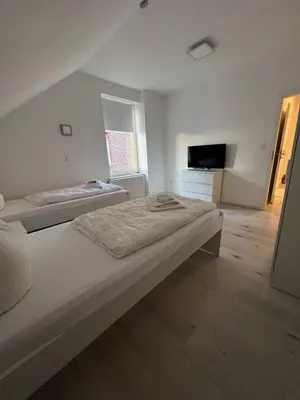 Ein Bett oder Betten in einem Zimmer der Unterkunft Premium Apartment Bochum near Düsseldorf Airport