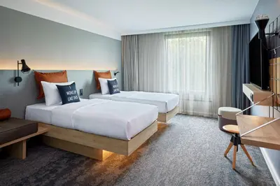 Ein Bett oder Betten in einem Zimmer der Unterkunft Moxy Bochum