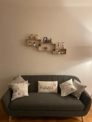 Ein Sitzbereich in der Unterkunft Ferienwohnung Baumberger-Auszeit
