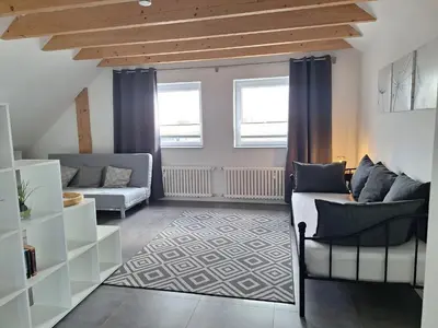 Ein Sitzbereich in der Unterkunft Moderne Wohnung in Krefeld