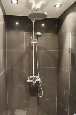 Ein Badezimmer in der Unterkunft Business Wieland Hotel