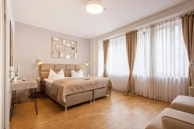 Ein Bett oder Betten in einem Zimmer der Unterkunft TM Hotel Düsseldorf