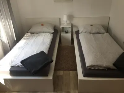 Ein Bett oder Betten in einem Zimmer der Unterkunft Ferienwohnung Lutz