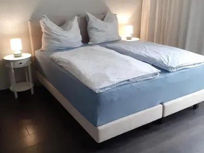 Ein Bett oder Betten in einem Zimmer der Unterkunft Apartment am Park