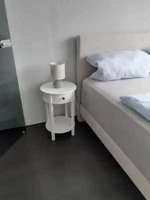 Ein Bett oder Betten in einem Zimmer der Unterkunft Apartment am Park
