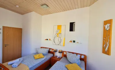 Ein Bett oder Betten in einem Zimmer der Unterkunft ELENA flat Tulpe Duisburg Zentrum