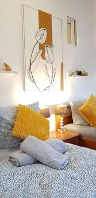 Ein Bett oder Betten in einem Zimmer der Unterkunft ELENA flat Tulpe Duisburg Zentrum