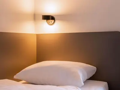 Ein Bett oder Betten in einem Zimmer der Unterkunft B&B Hotel Duisburg Hbf-Nord