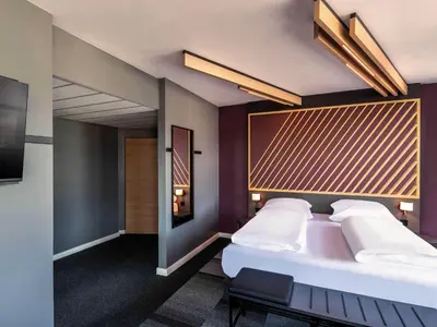 Ein Bett oder Betten in einem Zimmer der Unterkunft B&B Hotel Duisburg Hbf-Nord