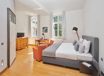 Ein Bett oder Betten in einem Zimmer der Unterkunft Hotel Mutterhaus Düsseldorf