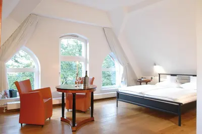 Ein Bett oder Betten in einem Zimmer der Unterkunft Hotel Mutterhaus Düsseldorf