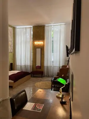 Ein Bett oder Betten in einem Zimmer der Unterkunft Hotel Amical